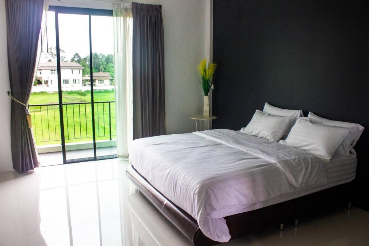 De Vine House Hotel Roi Et Buitenkant foto